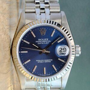 ROLEX OYSTERL PERPETUAL 31 MM BLUE INDEX DIAL STEEL FLUTED JUBILEE WATCH 68274